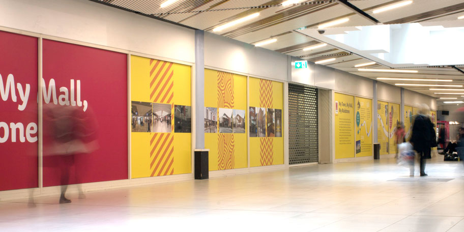 Wall hoarding designed by Bison in Maidstone with bright yellows and reds