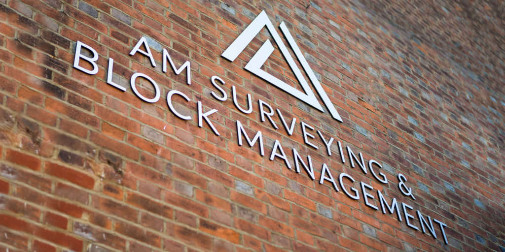 3D wall logo for AM Surveying