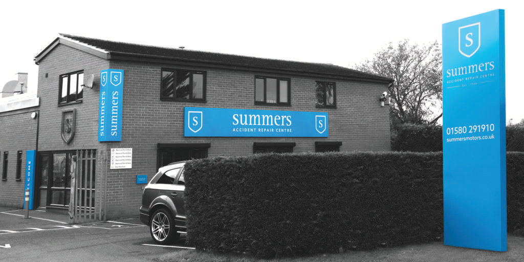 Outdoor signage for Summers repair centre